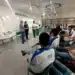 Estudantes do SESI participando de evento de qualificação profissional em sala de aula.