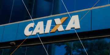 Fachada de uma agência da Caixa Econômica Federal com logotipo destacado em letras brancas sobre fundo azul.