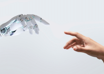 Mão de robô futurista se aproximando da mão de uma pessoa, simbolizando a interação entre humanos e inteligência artificial