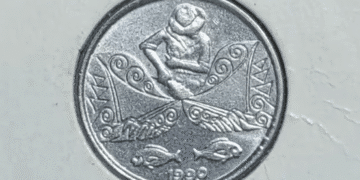 Moeda de 5 centavos de 1990 com imagem de pescador e possível erro de cunhagem