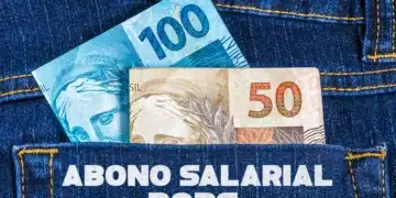 Notas de dinheiro representando o abono salarial PASEP pago pelo Banco do Brasil em 2026.