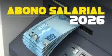 Dinheiro do Abono Salarial 2026 sendo retirado de caixa eletrônico, com destaque para as notas de 100 reais.