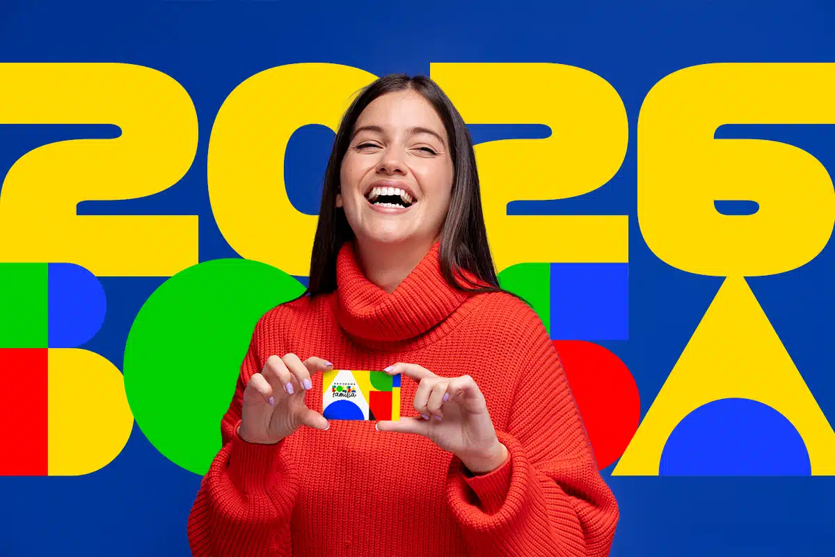 Calendário de pagamento do Bolsa Família em fevereiro de 2026 Beneficiária do Bolsa Família segurando cartão e consultando calendário de pagamento de fevereiro de 2026