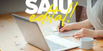 Candidato se preparando para o Concurso ESA 2027 estudando com notebook e caderno