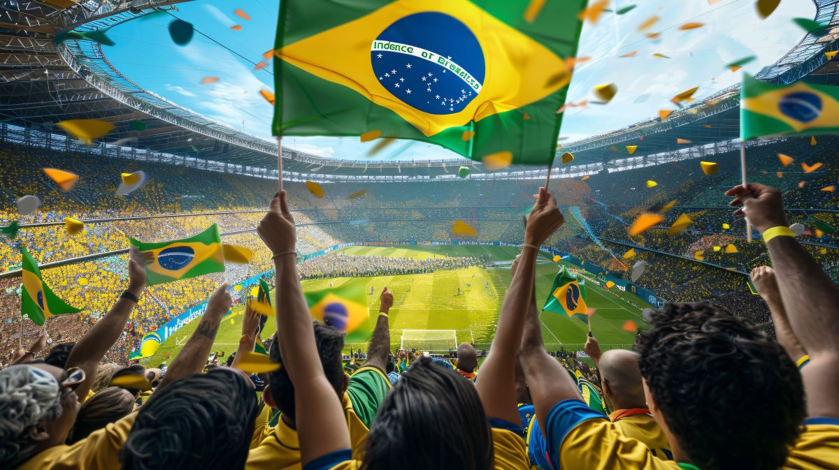 Torcida brasileira em êxtase no estádio com bandeiras e confetes.