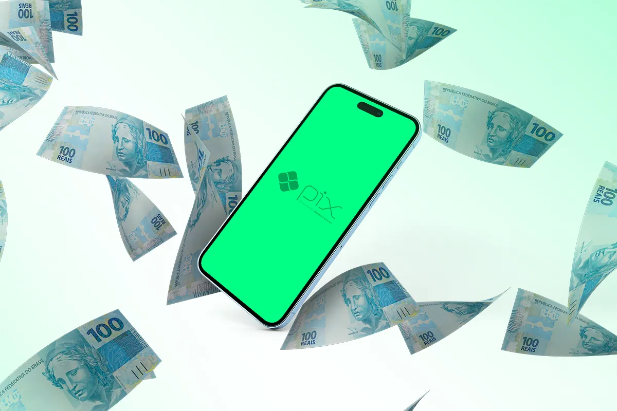Monitoramento do pix. Smartphone com logo Pix rodeado por notas de 100 reais voando.
