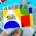 Cartão do Programa Bolsa Família em destaque sobre notas de reais ao fundo, representando o pagamento antecipado do benefício em abril de 2026 para famílias em situação de emergência
