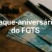 Notas de reais, calculadora, moedas e caderno sobre mesa com texto Saque-aniversário do FGTS — quem pode retirar o dinheiro em abril 2026